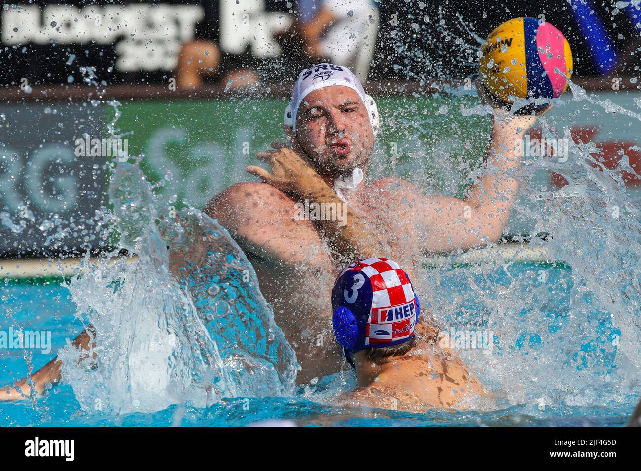 BUDAPEST, HUNGARY - JUNE 29: Dusan Mandic of Serbia, Ivan Krapic of Croatia during the FINA World Championships Budapest 2022 Quarter final match between Serbia and Croatia on June 29, 2022 in Budapest, Hungary (Photo by Albert ten Hove/Orange Pictures) Stock Photo