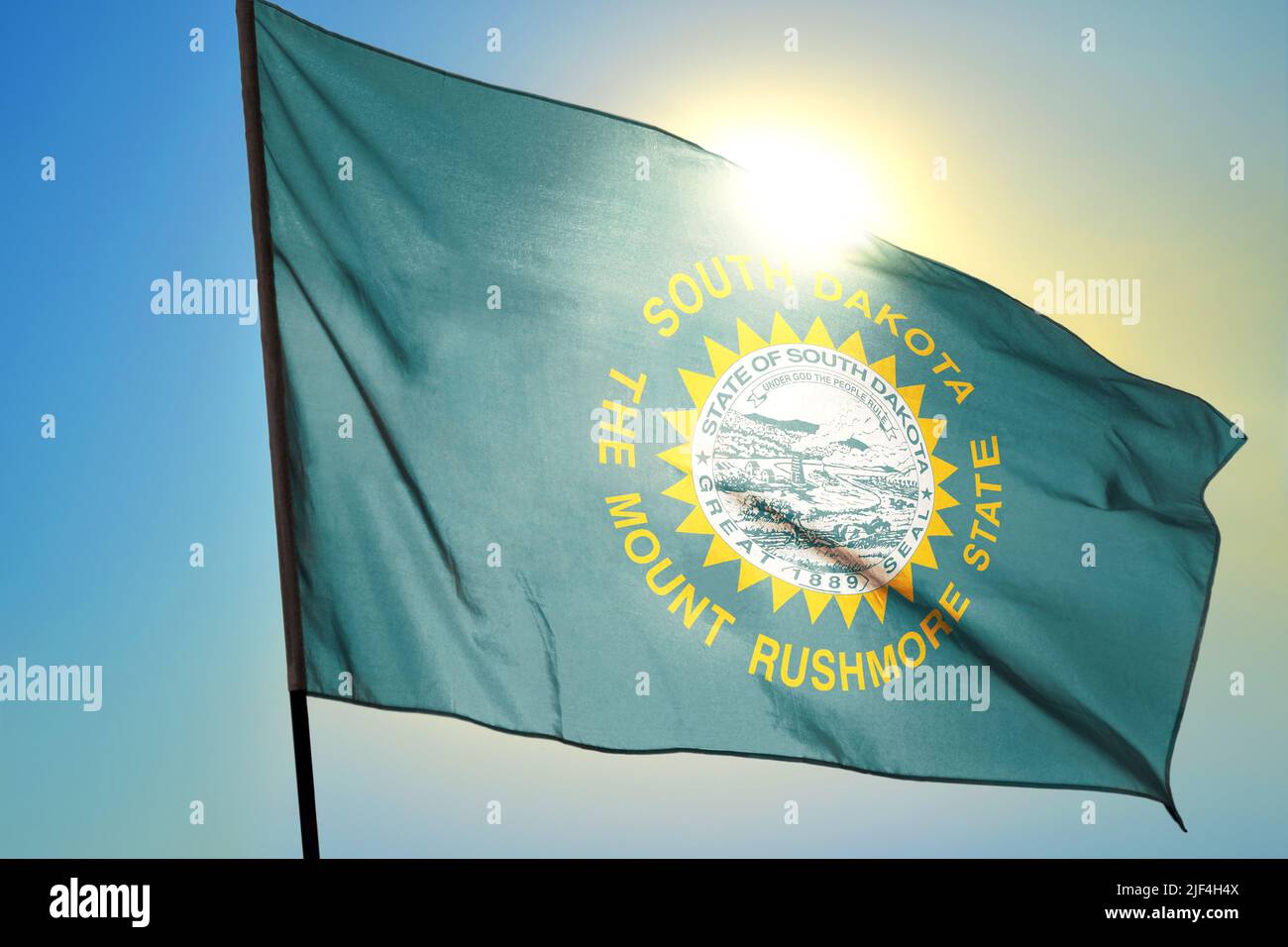 South Dakota state of United States flag waving on the wind Stock Photo