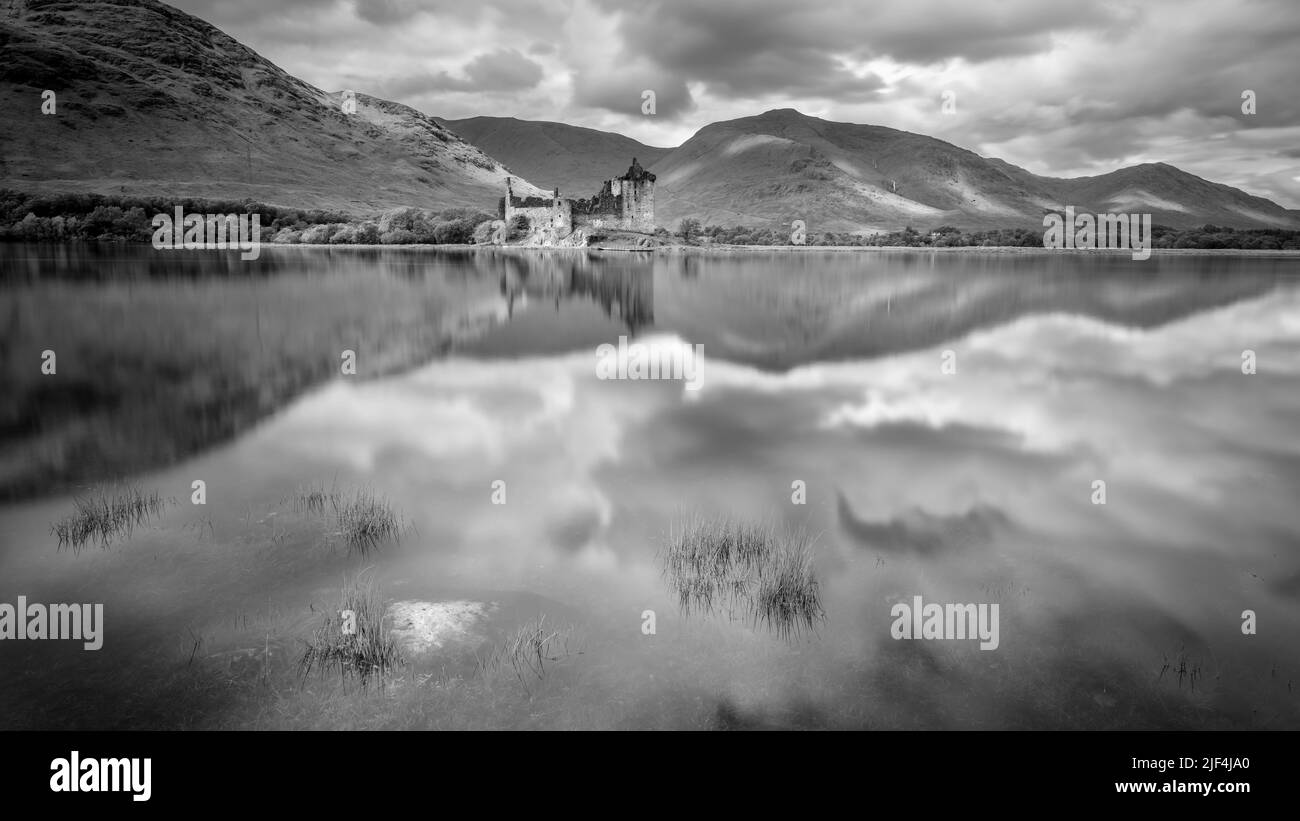A long exposure photograph of Kilchurn Castle on Loch Awe in the region of Argyll in Scotland, UK Stock Photo