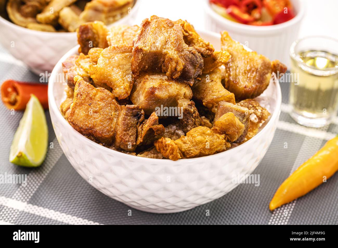 Crackling bowl, Brazilian appetizer made by frying bacon, leather or
