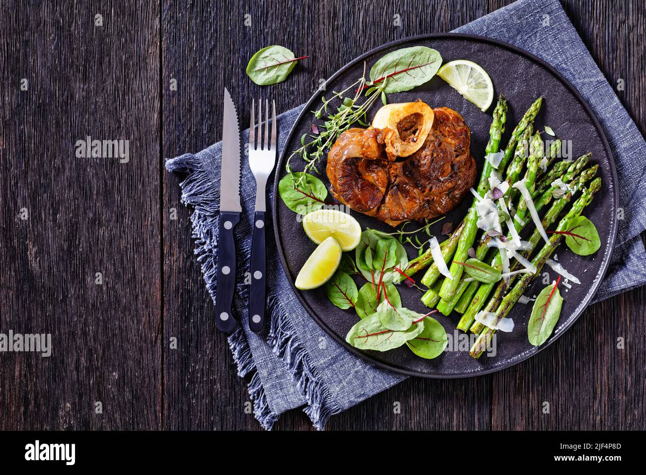 braised osso buco, veal shank steak with grilled asparagus, lime and