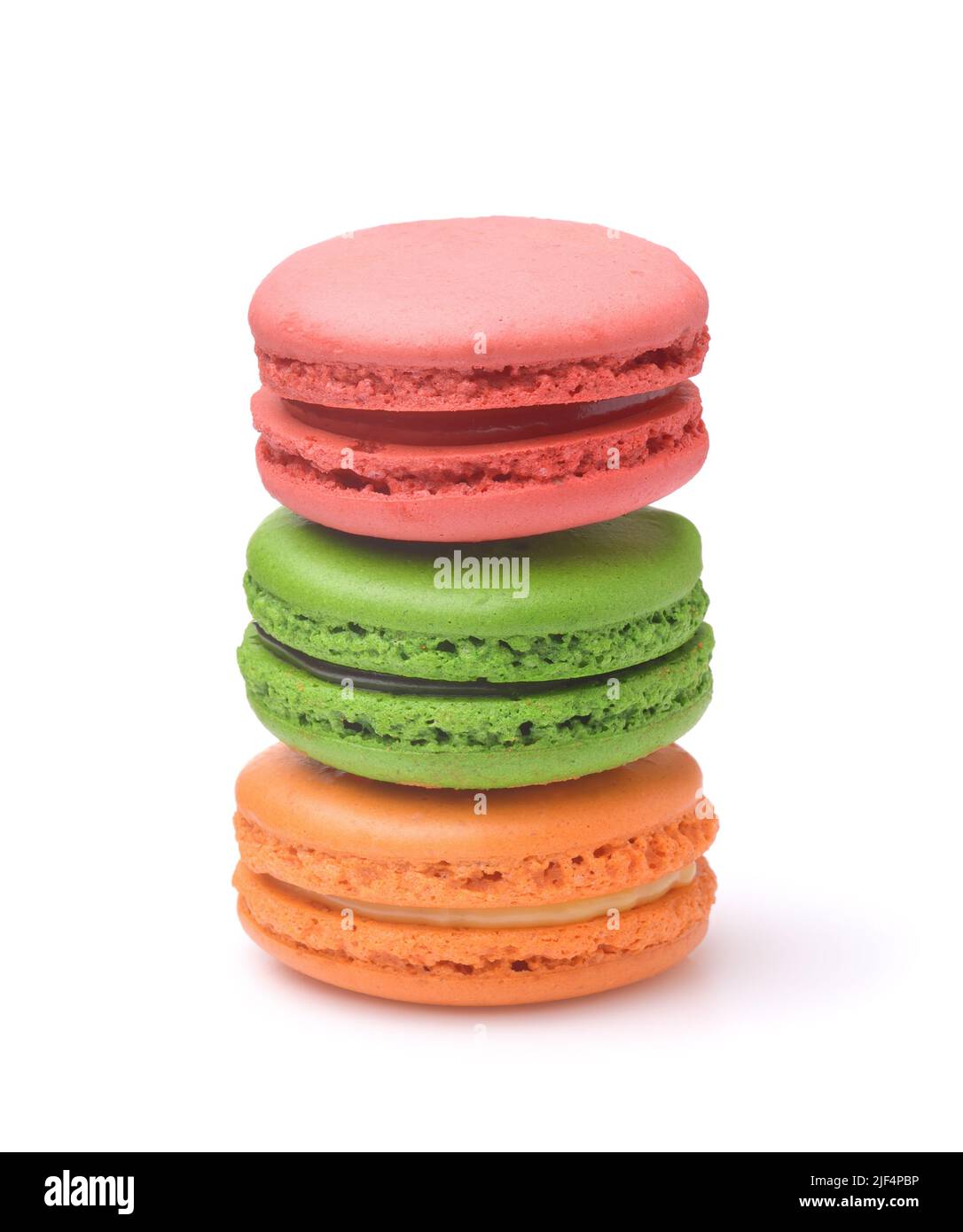 Front view of three colorful macaroons isolated on white Stock Photo
