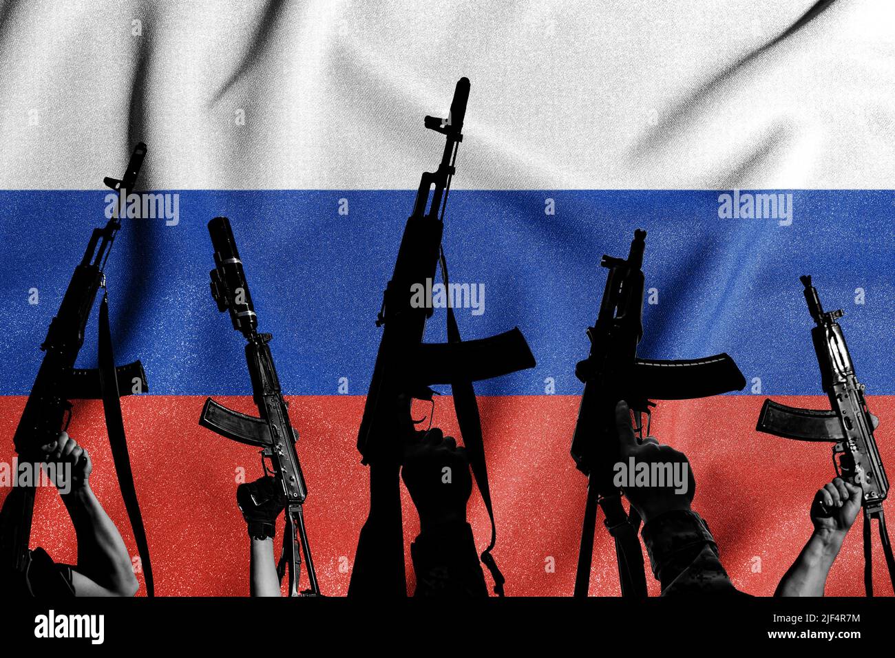 Russia flag and combat military assault rifles AK 74 and AK 74U on its background, terrorist group, war and destruction. Stock Photo