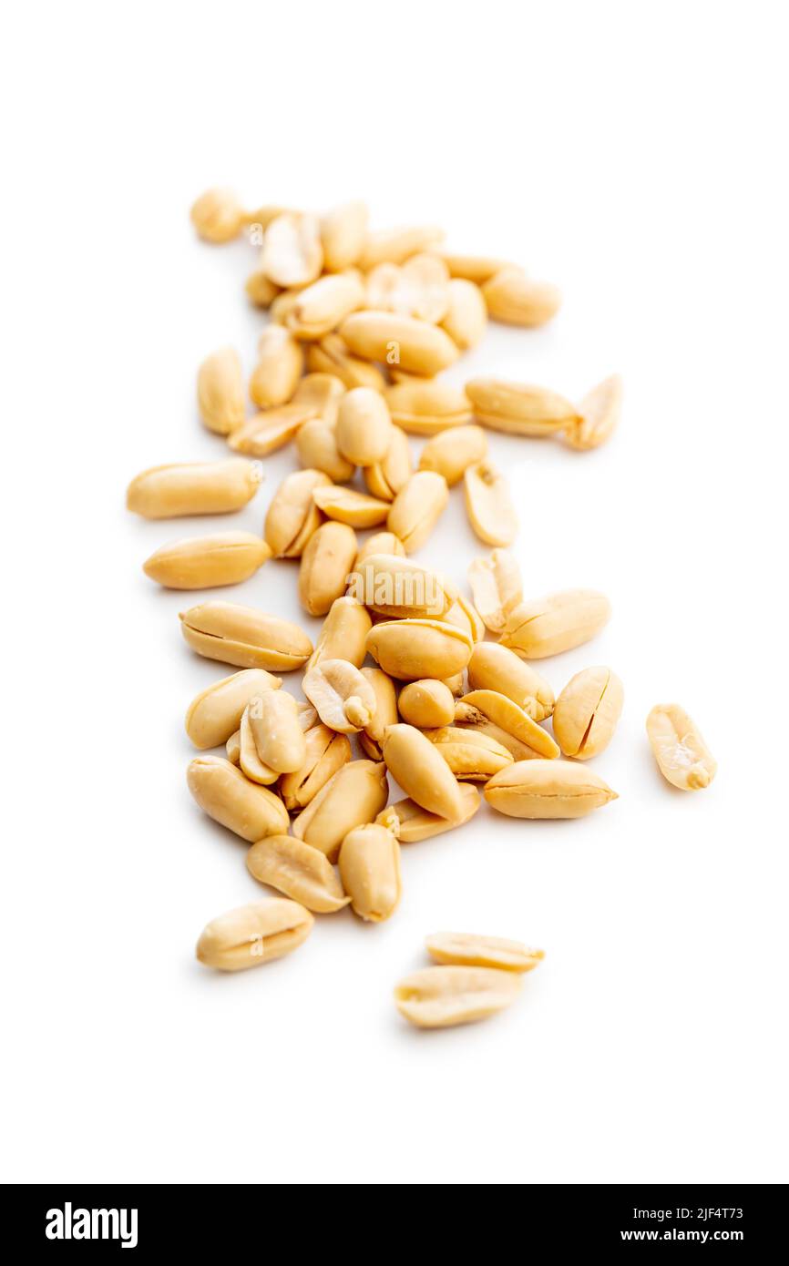 Roasted peeled peanuts isolated on a white background. Stock Photo