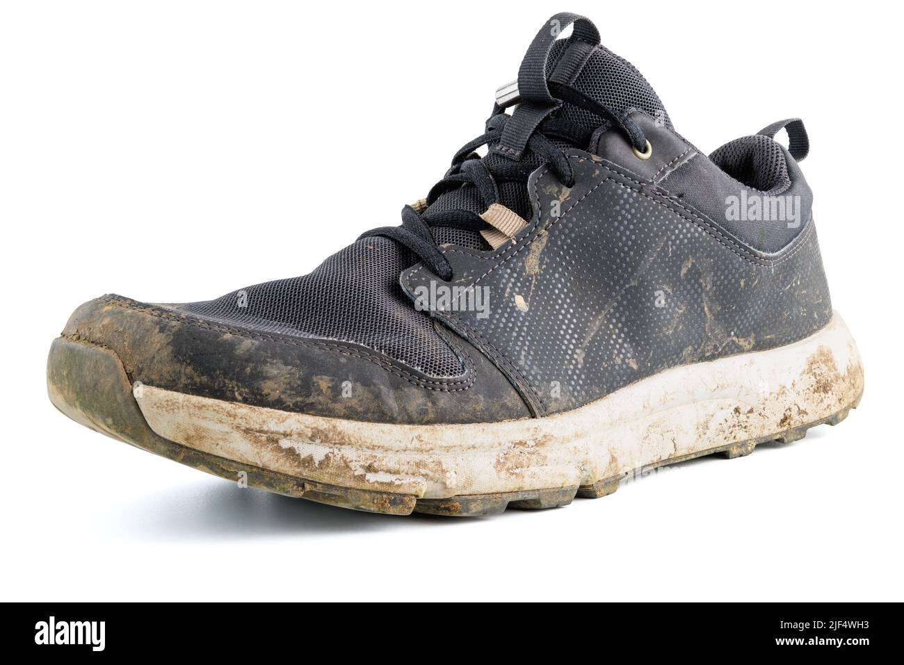 dirty sport shoe sneaker isolated on white background Stock Photo - Alamy