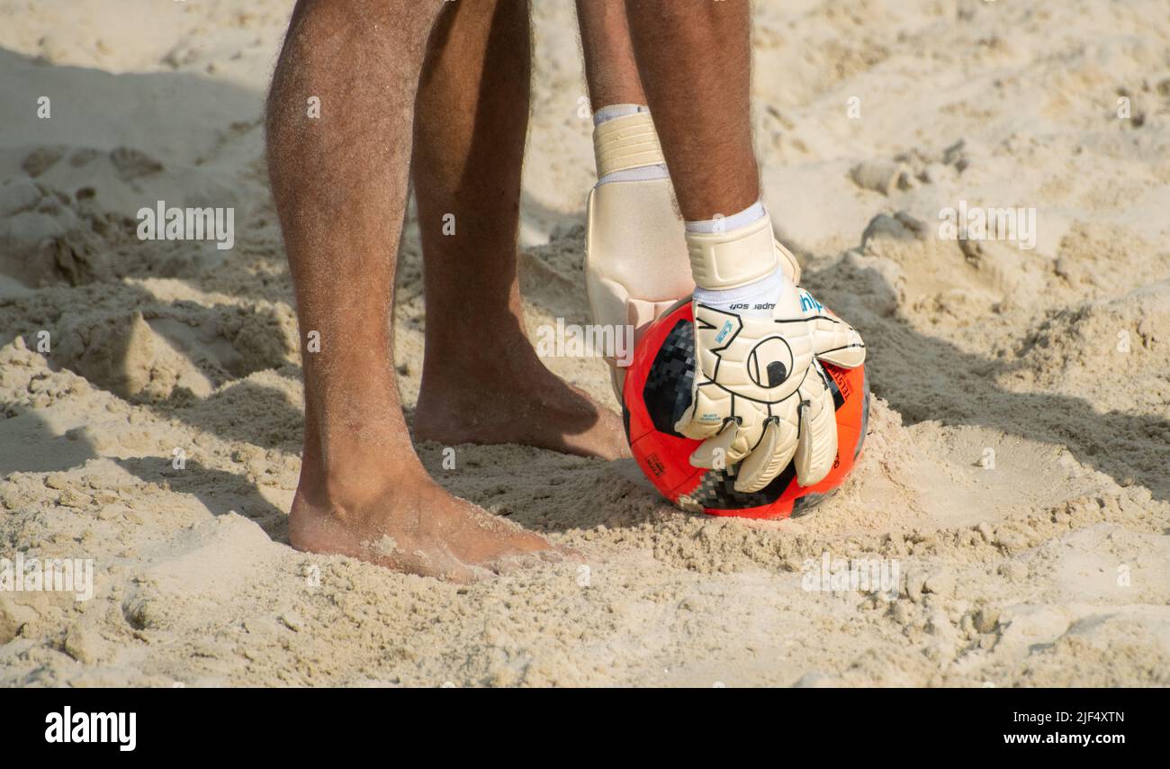 July 26, 2019, Moscow, Russia. The goalkeeper sets the ball on the sand for a kick during a beach soccer match. Stock Photo