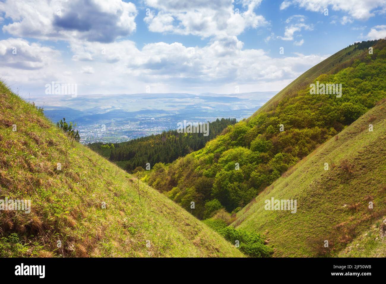 Meadows and forests on the slopes of the Borgustan Range, North Caucasus Stock Photo