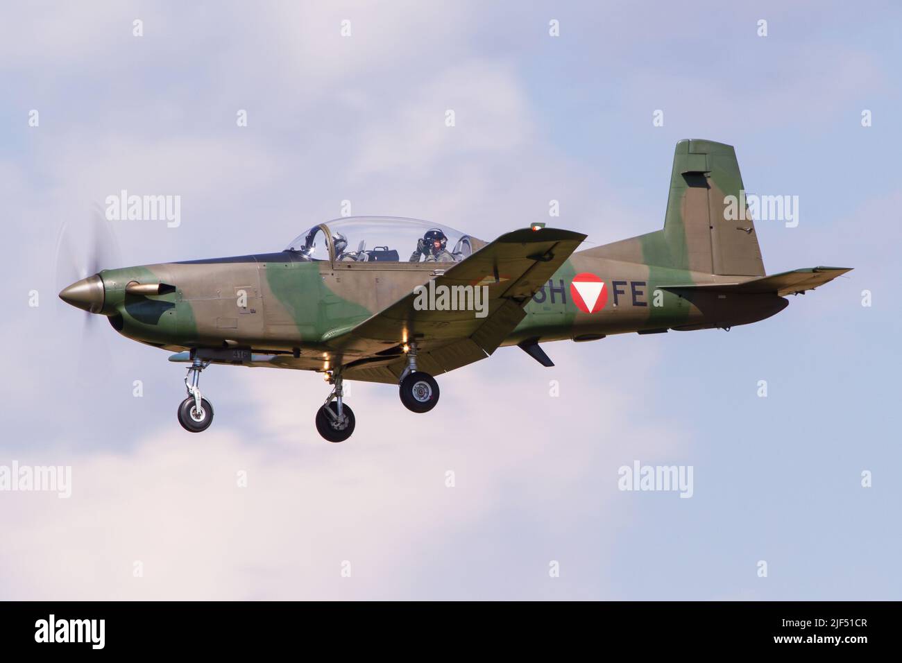 A Pilatus PC-7 training aircraft of the Austrian Air Force coming in for landing in Zeltweg in Austria Stock Photo