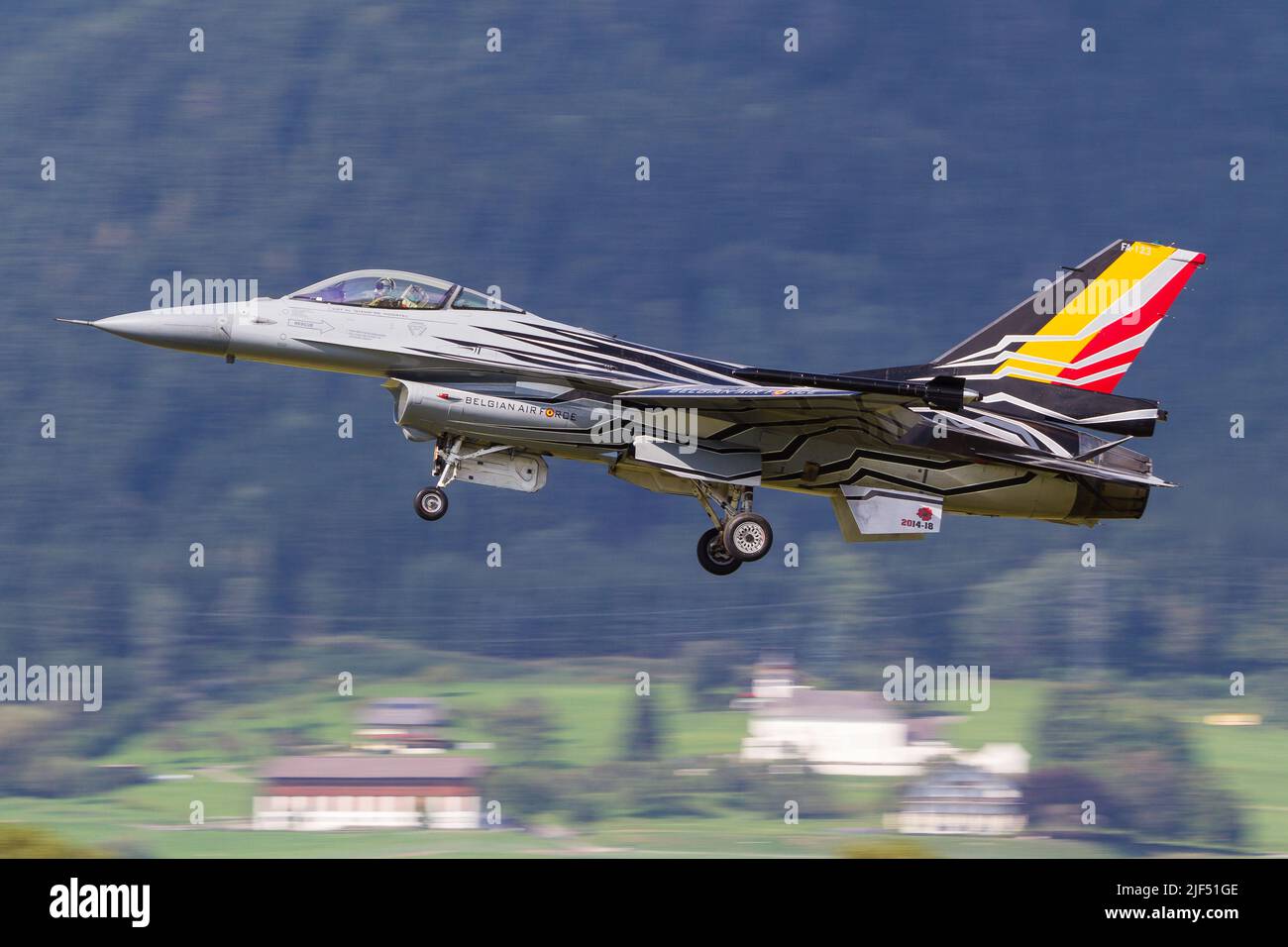 A colorful Belgian Air Force F16 fighter jet landing in Zeltweg in Austria Stock Photo