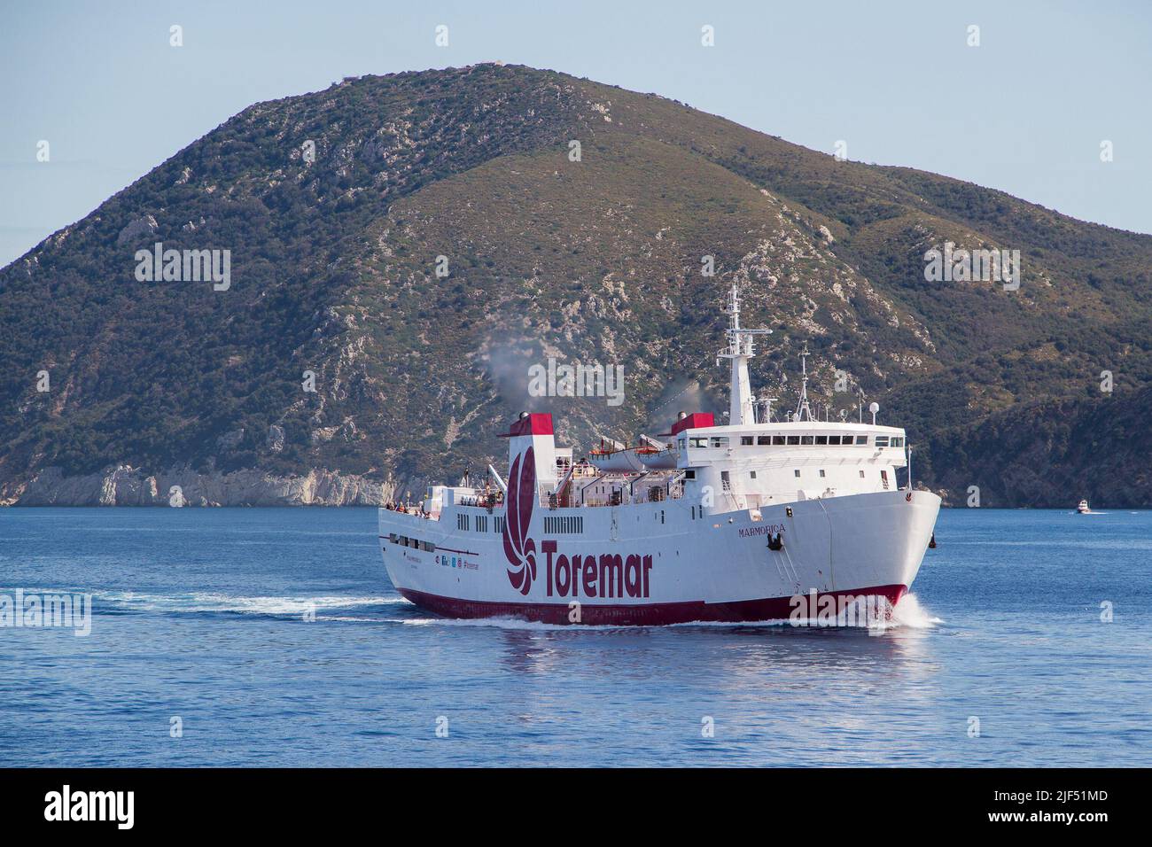 A ferry ship called Marmorica of Toremar lines arriving Portoferraio at the island of Elba for Livorno Stock Photo