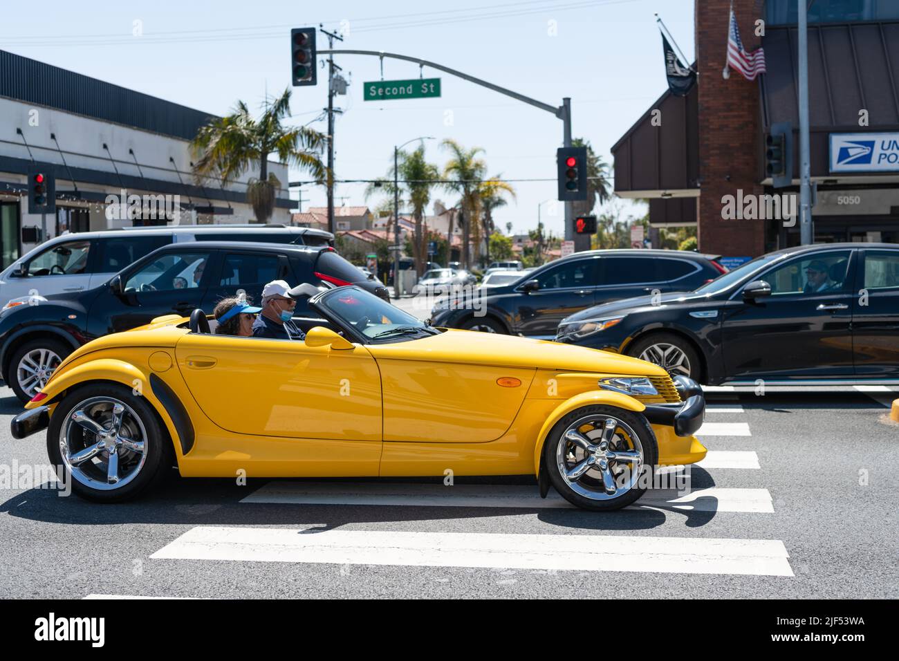 Long Beach, California USA - March 31, 2021: classic car of yellow Chrysler Plymouth Prowler. side Stock Photo