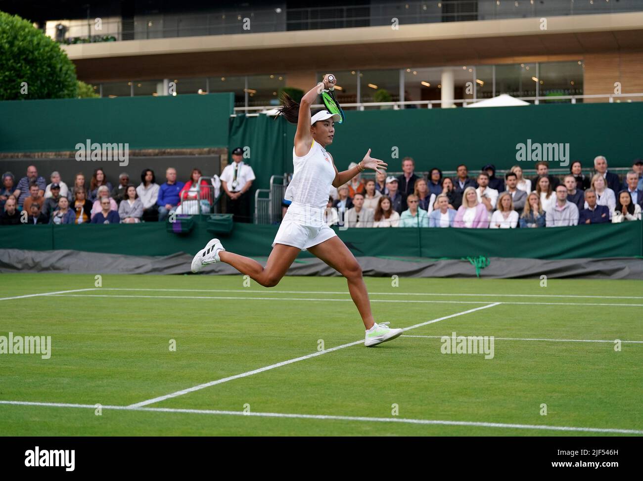 Wang Qiang in action against Heather Watson on day three of the 2022 Wimbledon Championships at the All England Lawn Tennis and Croquet Club, Wimbledon. Picture date: Wednesday June 29, 2022. Stock Photo