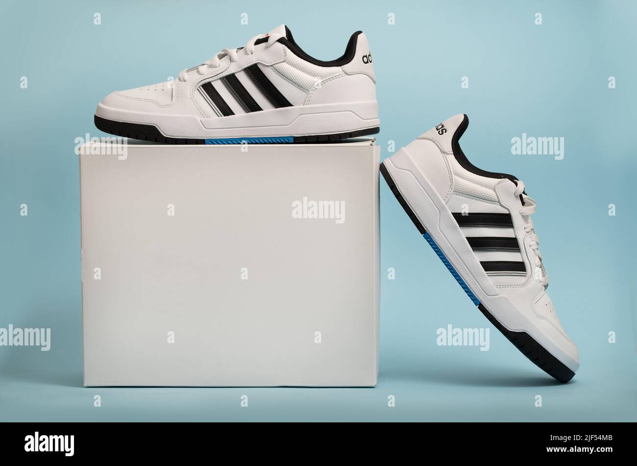 Belgrade, Serbia - May 11, 2022. New Adidas tennis shoes on white  background with package box. New Adidas Sneakers or trainers on blue  background. Men Stock Photo - Alamy