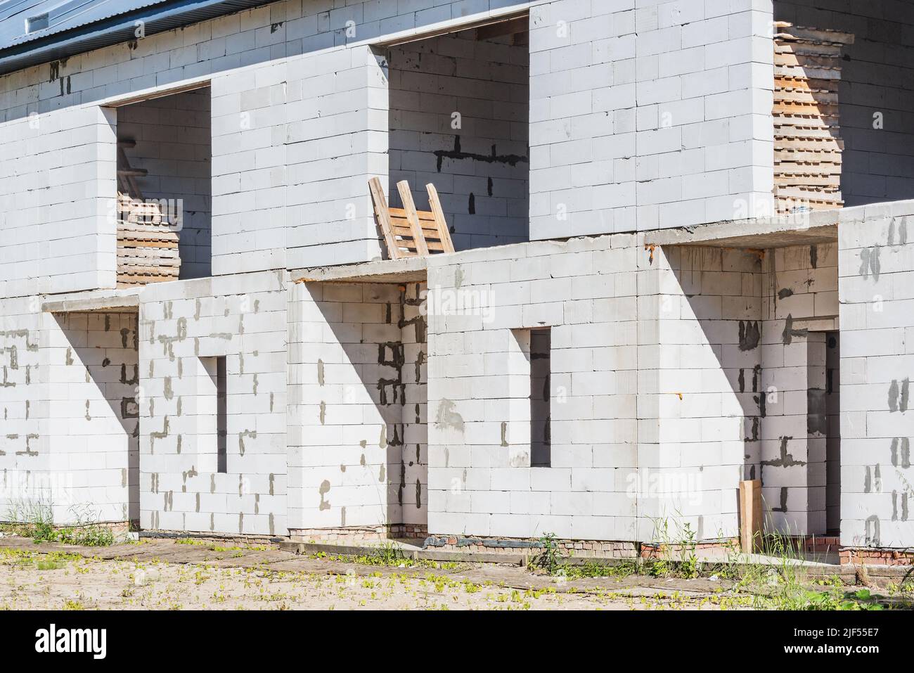 View of construction site with wall hi-res stock photography and images ...