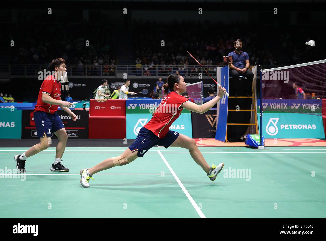 Kuala Lumpur, Malaysia. 29th June, 2022. Liu Xuan Xuan and Xia Yu Ting (R) of China play against Pearly Tan and Thinaah Muralitharan of Malaysia during the Women's Doubles round one match of the Petronas Malaysia Open 2022 at Axiata Arena, Bukit Jalil. Credit: SOPA Images Limited/Alamy Live News Stock Photo