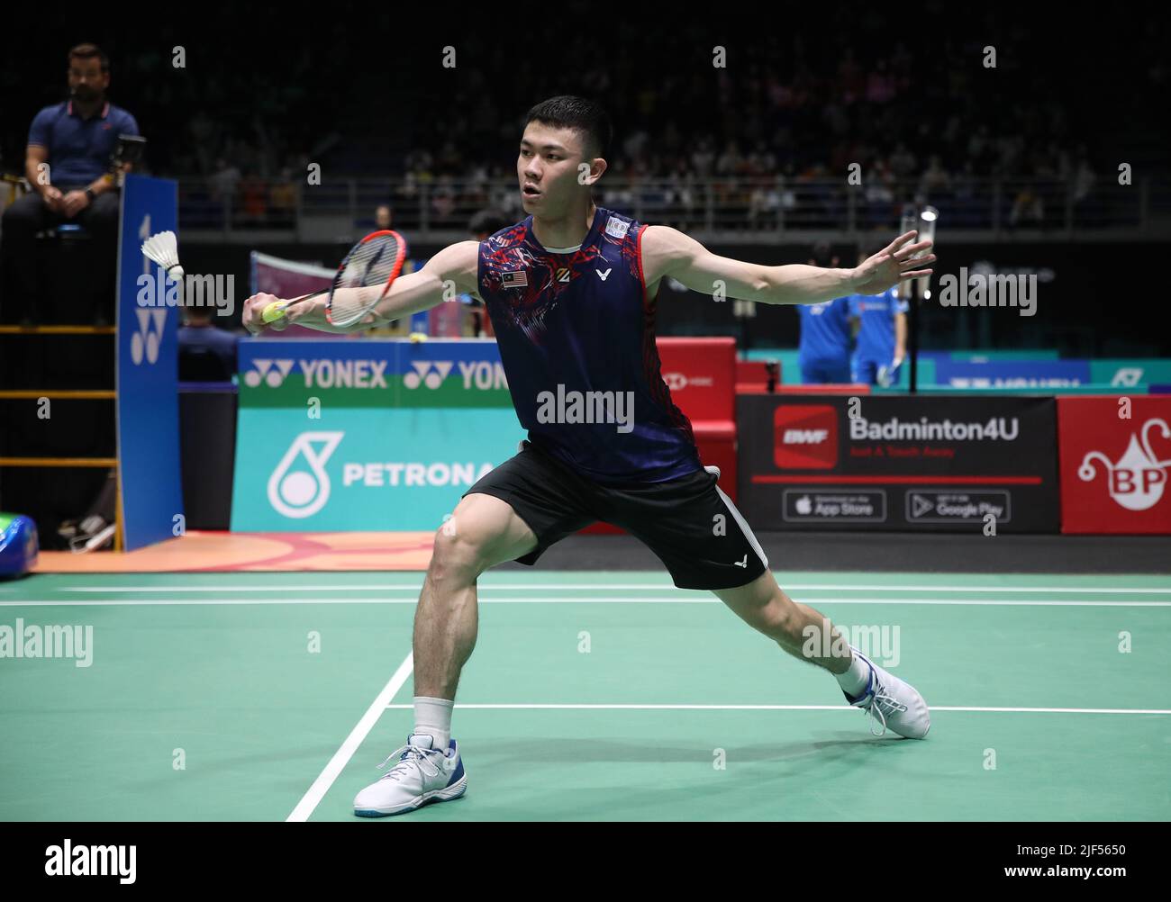 Lee Zii Jia of Malaysia plays against Dwi Wardoyo Chico Aura of Indonesia during the team final of the mens singles match at the Badminton Asia Team Championships 2022 in Shah Alam