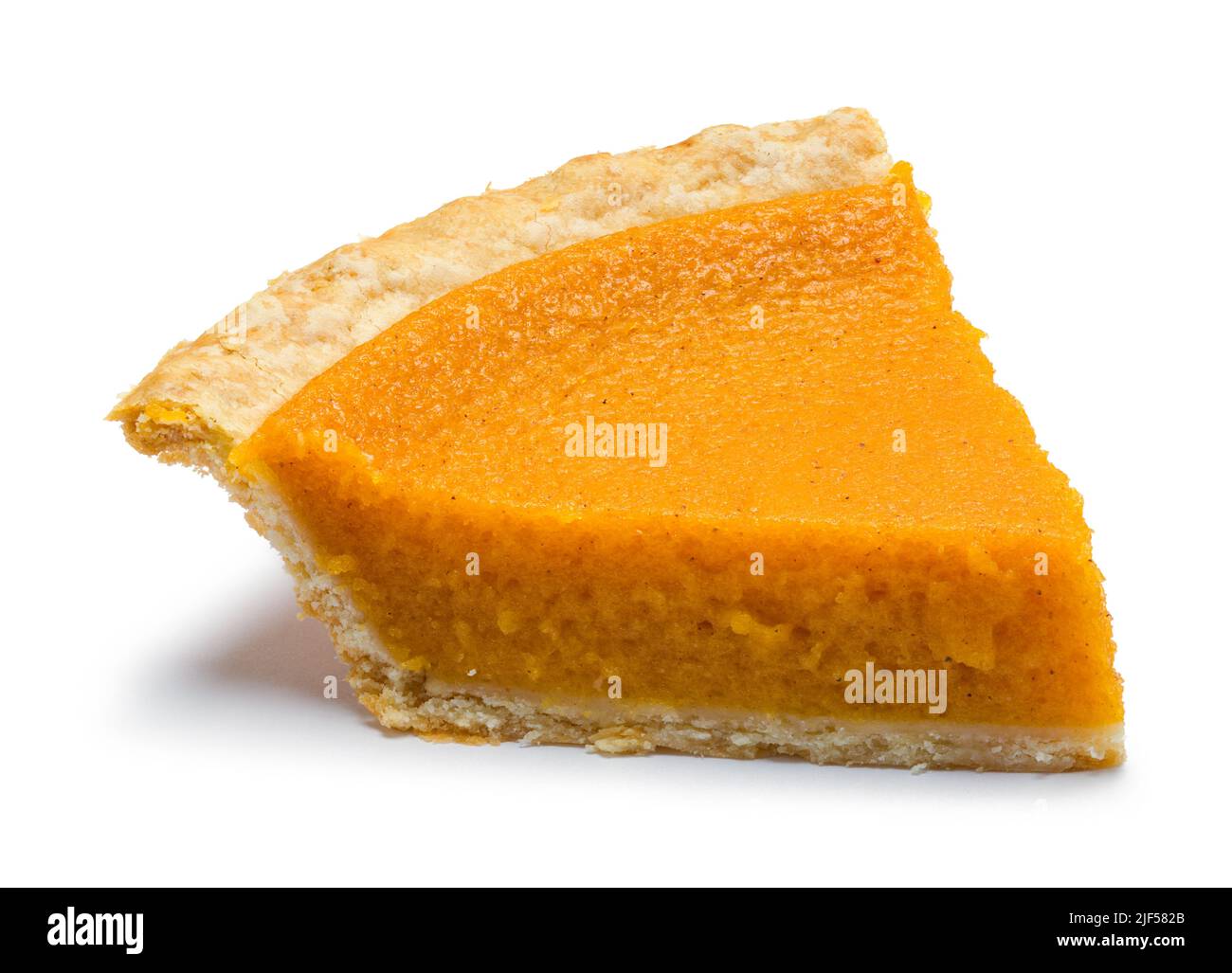 Slice of Pumpkin Pie Cut Out on White. Stock Photo