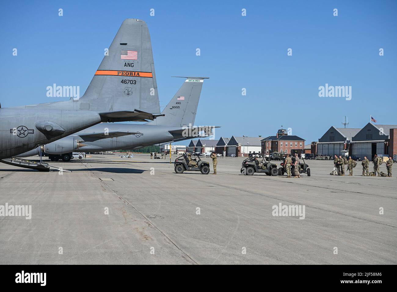 Two C-130 Hercules aircraft from the 182nd Airlift Wing make a stop at Selfridge Air National Guard Base, Michigan, on June 28, 2022.  The aircraft and crew from the Illinois Air National Guard picked up cargo and personnel to deliver to K.I. Sawyer International Airport in Michigan’s Upper Peninsula as part of exercise Northern Agility 22-1.  NA 22-1 exercises Agile Combat Employment, a universal application to U.S. Air Force operations that enables Airmen to deliver air power anytime, anywhere to complicate an adversary’s decision making. (U.S. Air National Guard photo by Terry L. Atwell) Stock Photo