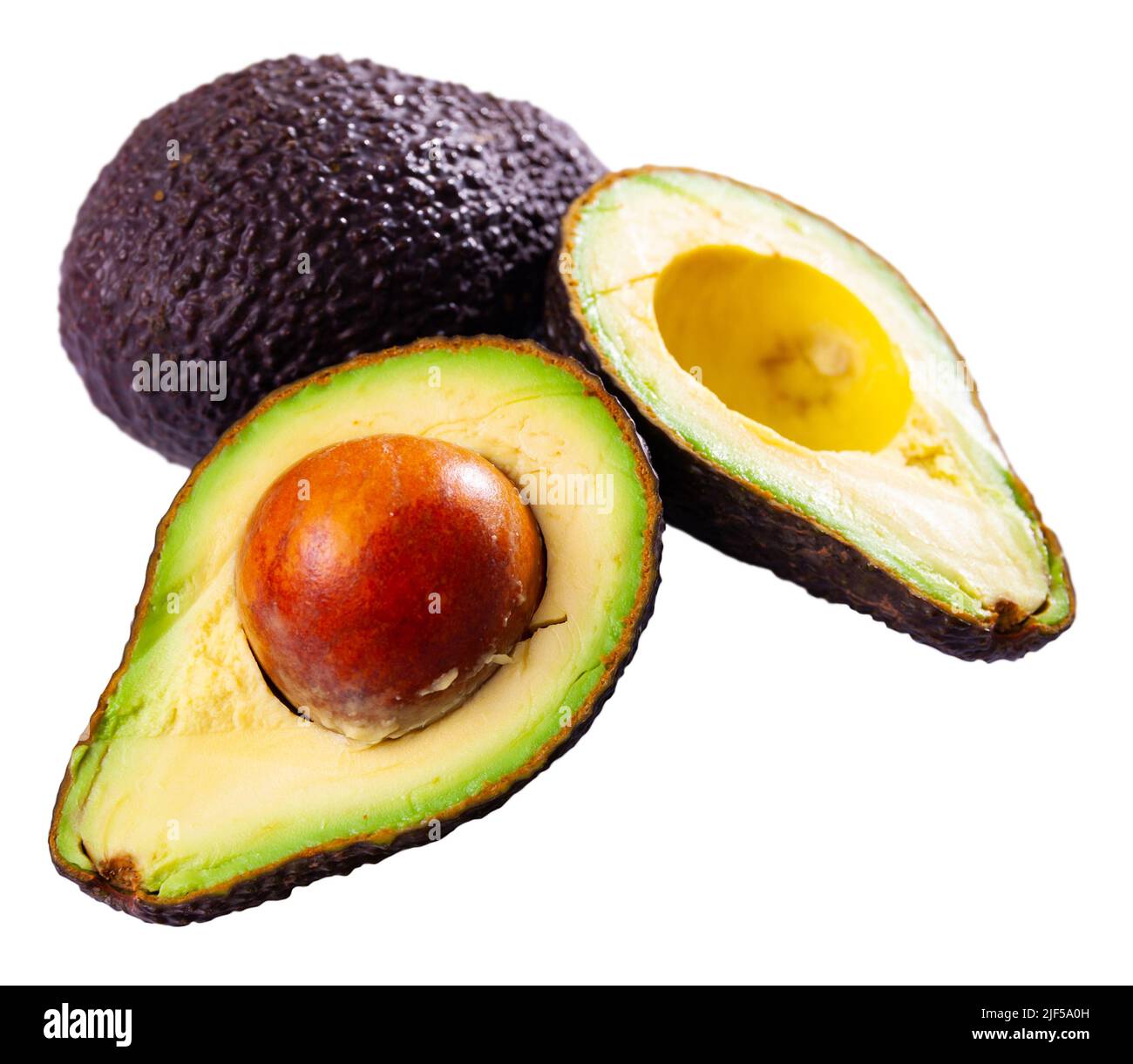 Whole and halved fresh avocados on white background Stock Photo - Alamy
