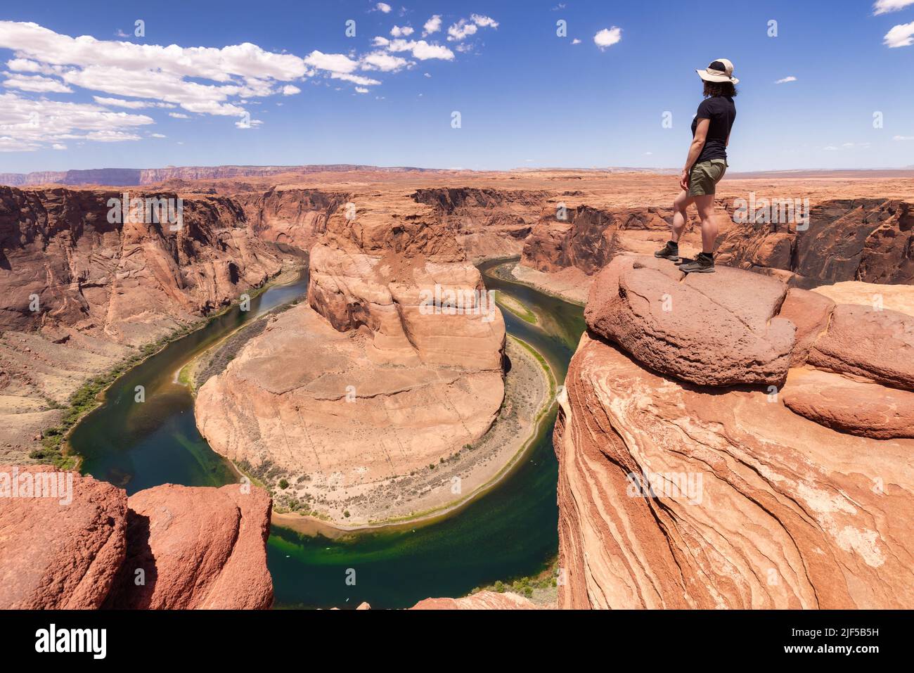 Adventurous Caucasian Woman at Horseshoe Bend in Page, Arizona, United