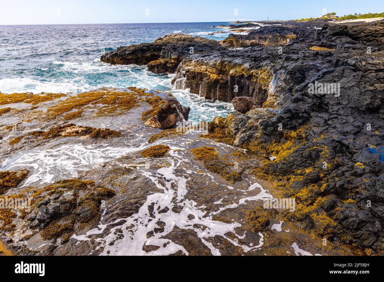 The Rugged Volcanic Coastline at Kalihi Point, Hawaii Island, Hawaii, USA Stock Photo