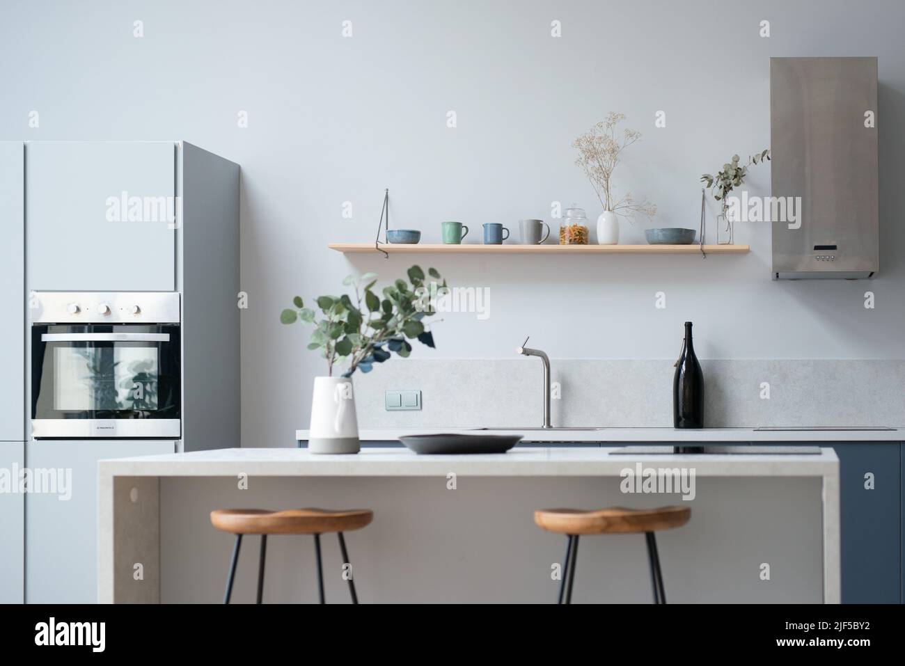 Modern new light interior of kitchen with white furniture and dining ...