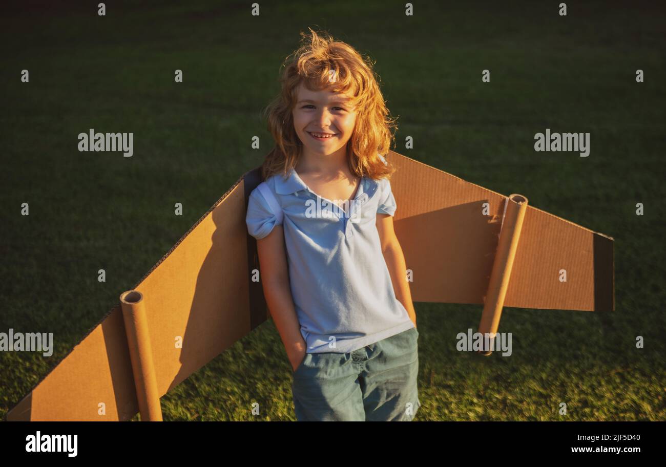 Child boy playing and dreaming about summer vacation and travel. Kids