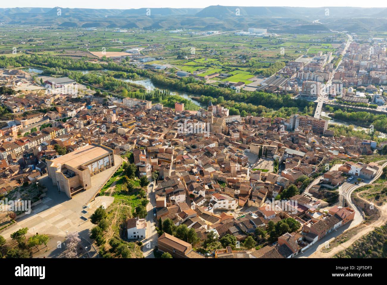 Aerial townscape of Fraga with view of Cinca River Stock Photo