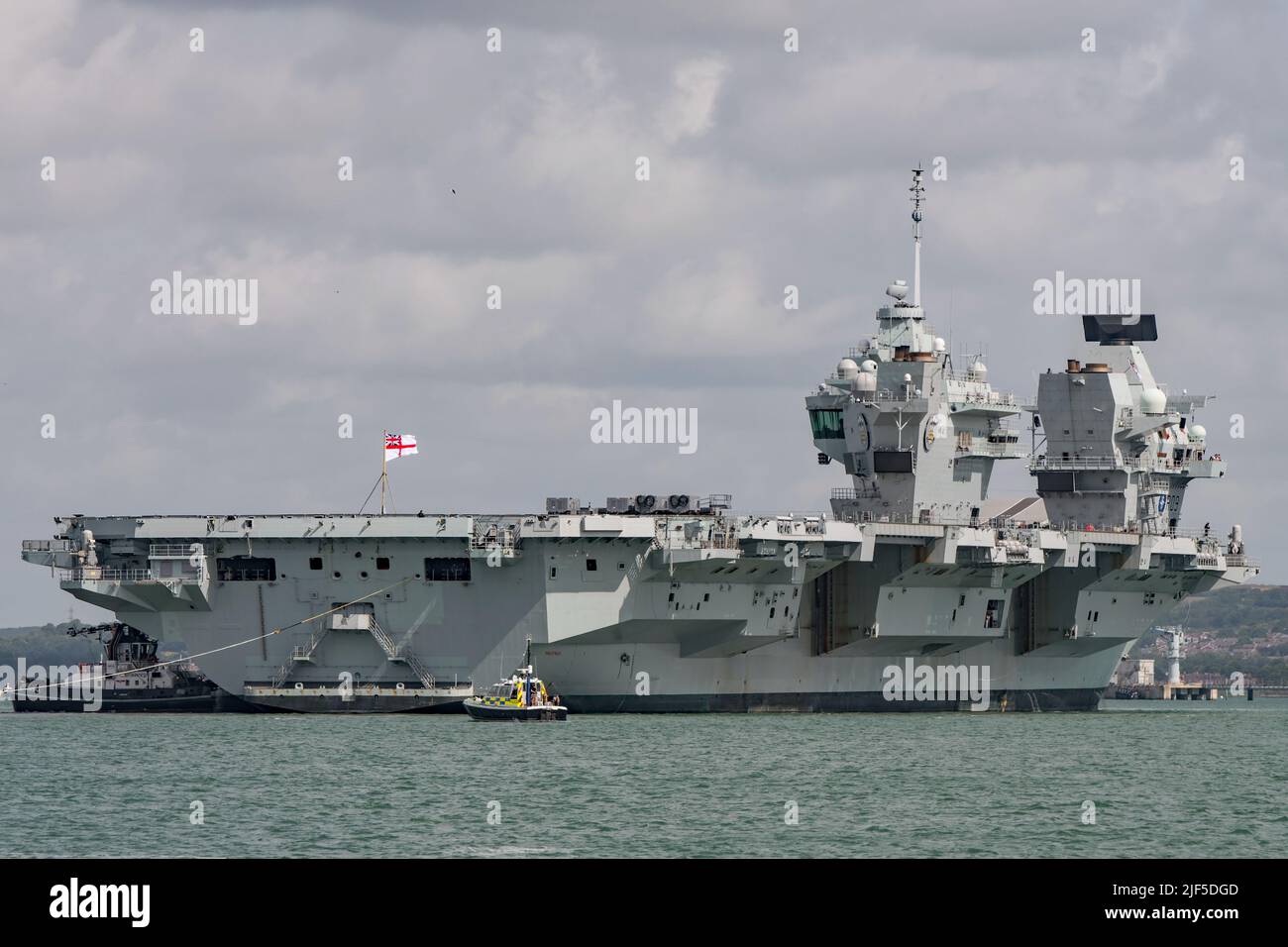 The Royal Navy aircraft carrier HMS Prince of Wales (R09) returned to Portsmouth, UK on the 25th June 2022 (Armed Forces Day) after NATO exercises. Stock Photo