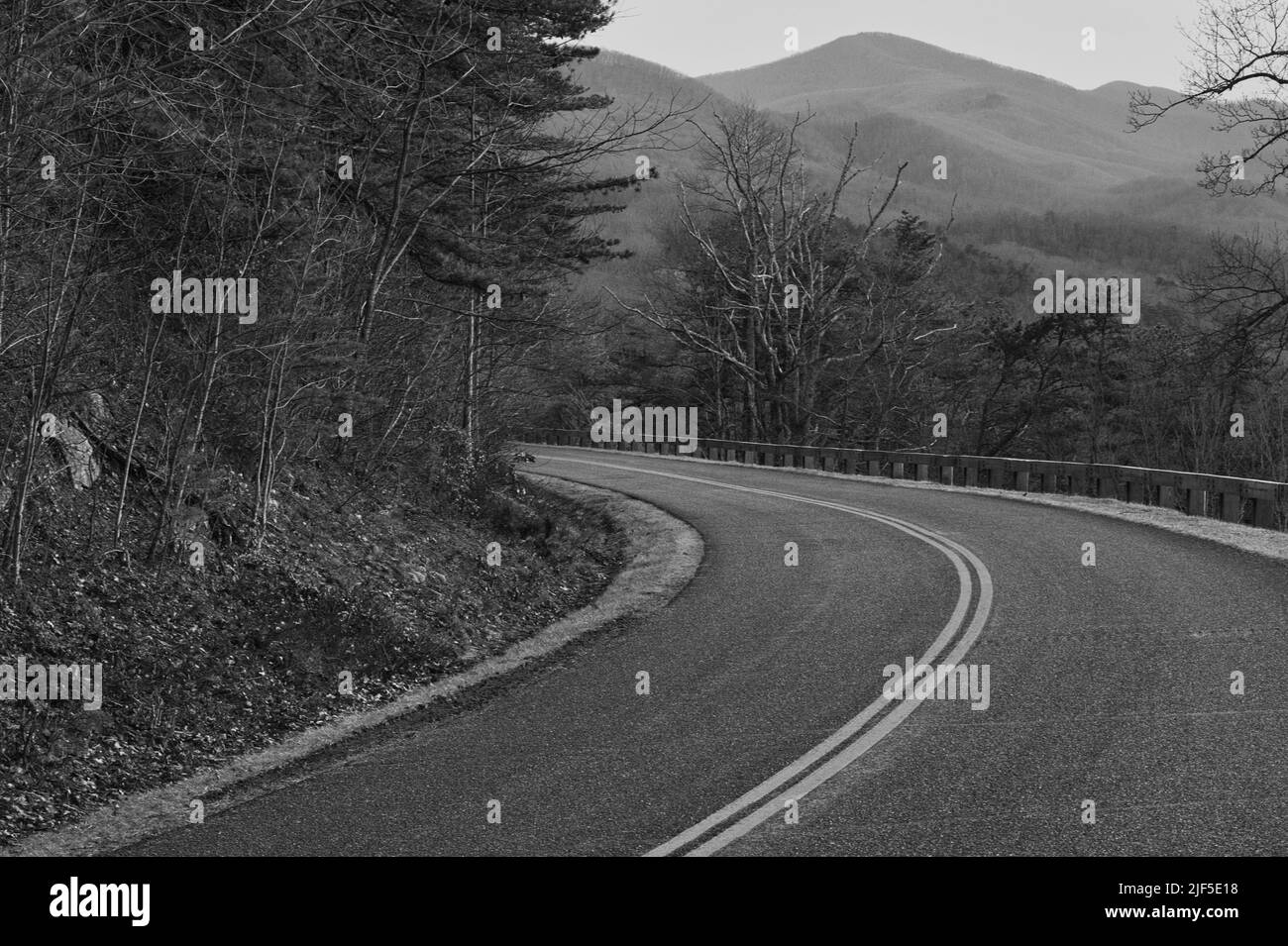 Road through rural field Black and White Stock Photos & Images - Alamy