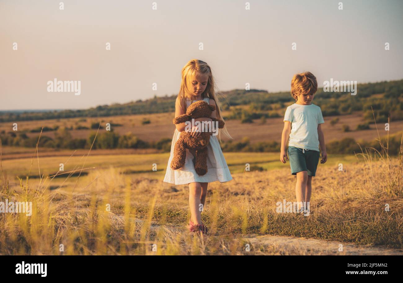 Bye bye. Little boy say good bye with little girl. Farewell concept