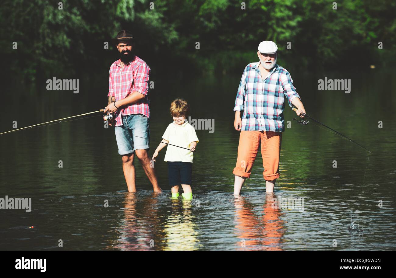 Grandfather, father and grandson fishing together. Coming together. Fly ...