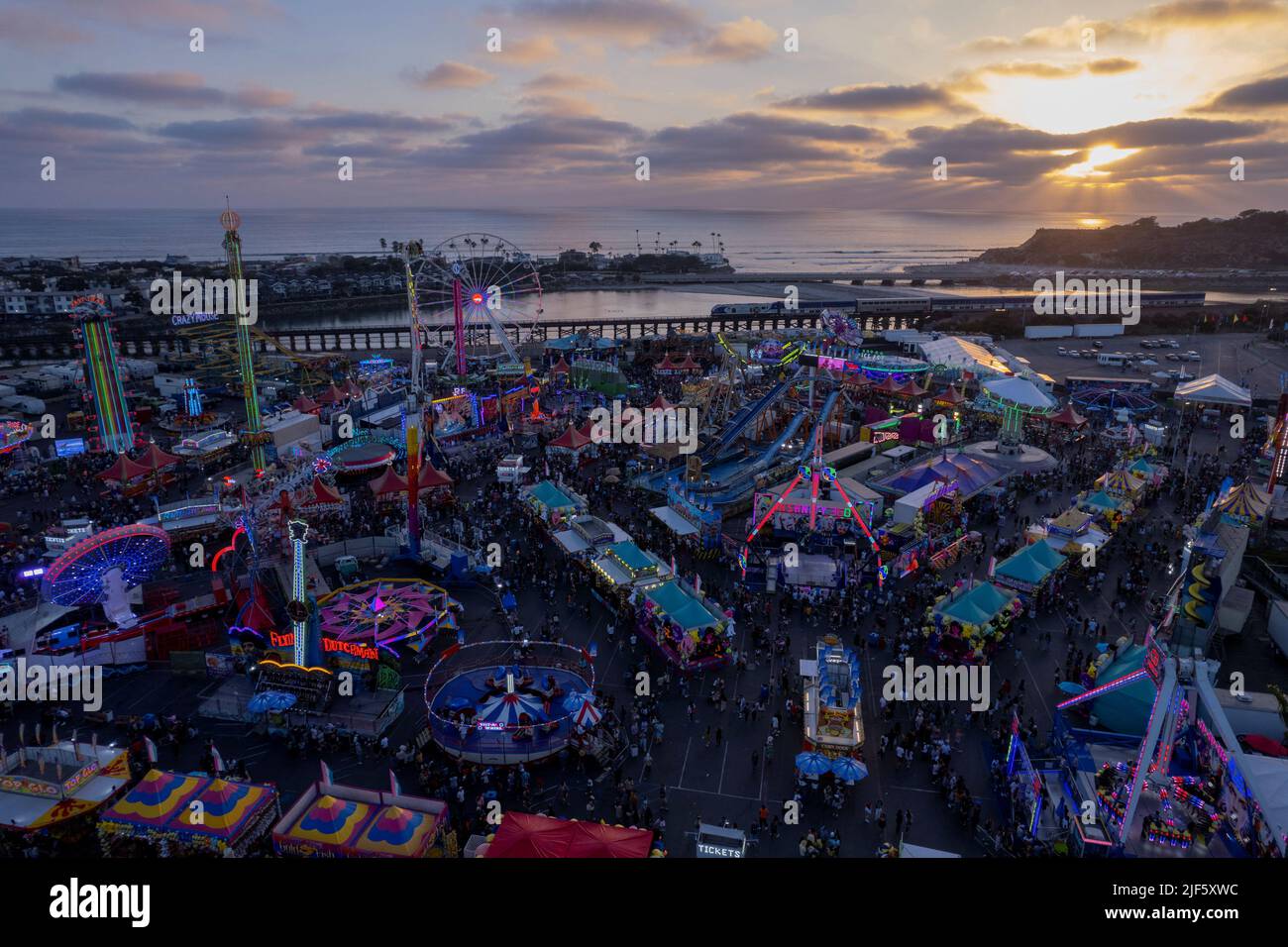 A general view shows people attending the San Diego County Fair, as Americans prepare for their annual 4th of July holiday, in Del Mar, California, U.S., June 29, 2022.  REUTERS/Mike Blake Stock Photo