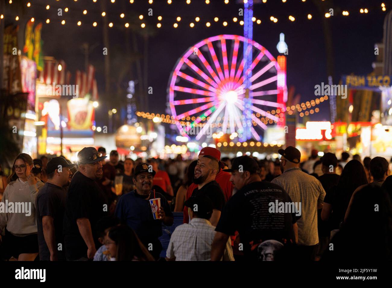People attend the San Diego County Fair, as Americans prepare for their annual 4th of July holiday, in Del Mar, California, U.S., June 29, 2022.   REUTERS/Mike Blake Stock Photo