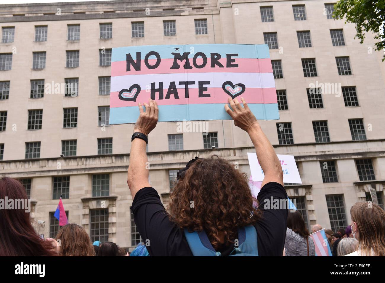 Pro Trans rights activists and protesters, demonstrated opposite Downing Street to stand up for LGBT+ rights and to demand from UK government to implement a trans-inclusive conversion therapy ban. Stock Photo