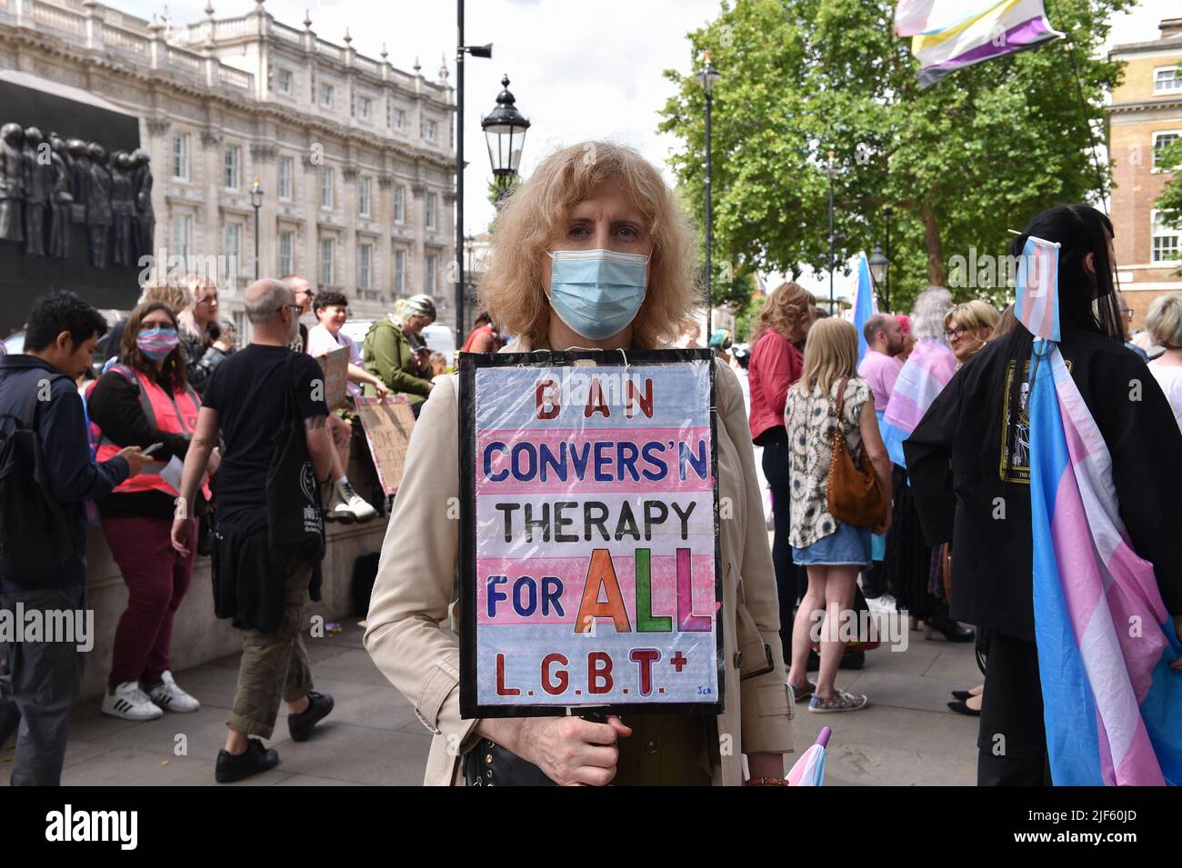 Pro Trans rights activists and protesters, demonstrated opposite Downing Street to stand up for LGBT+ rights and to demand from UK government to implement a trans-inclusive conversion therapy ban. Stock Photo