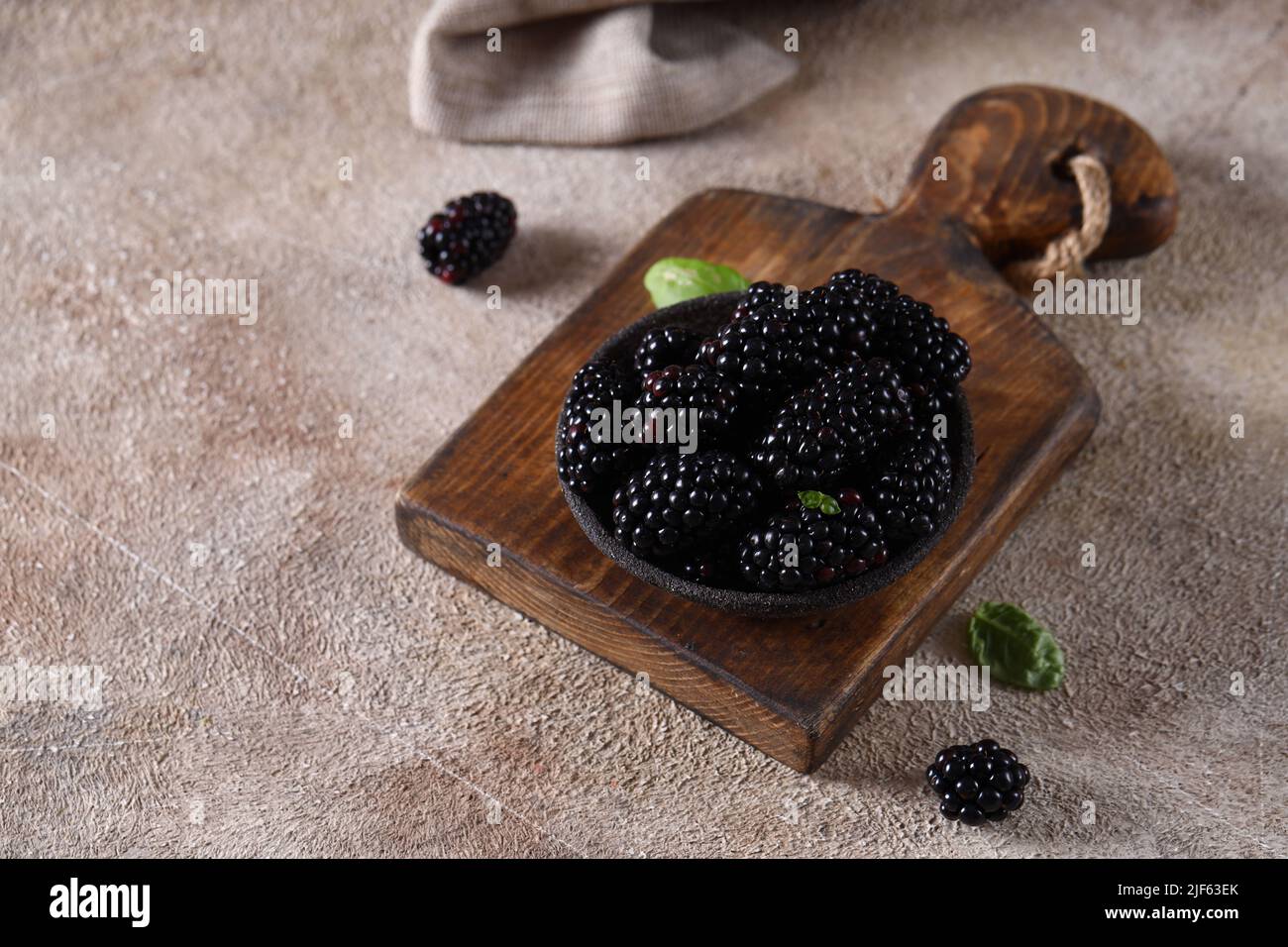organic fresh black raspberries on the table Stock Photo - Alamy