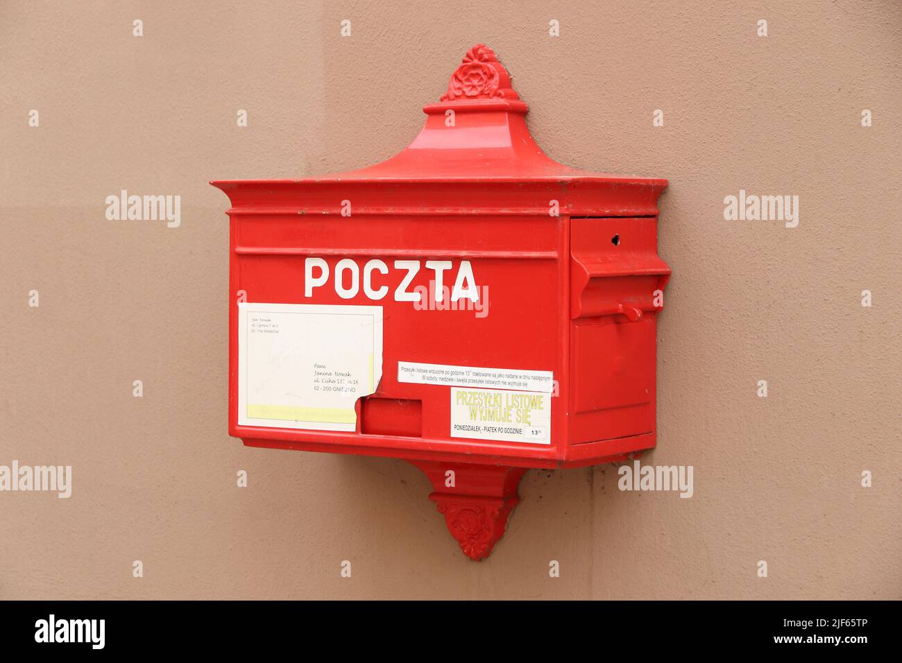 WROCLAW, POLAND - SEPTEMBER 2, 2018: Post box of Poczta Polska in a street of Wroclaw Old Town. Poczta Polska is the national public postal service op Stock Photo