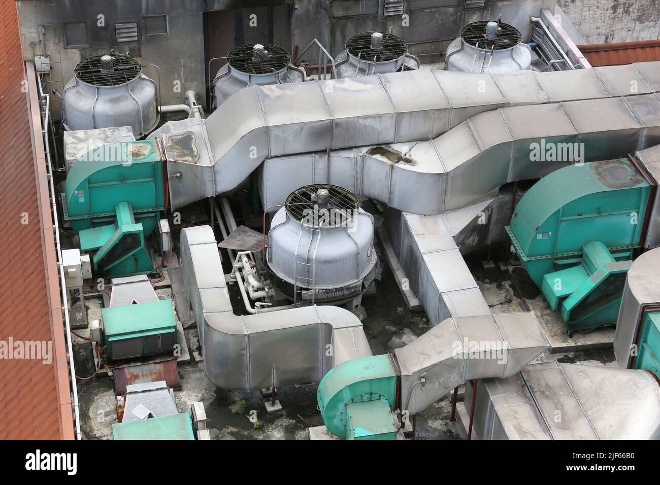 Air conditioning ducts on roof. HVAC systems atop office building. HVAC