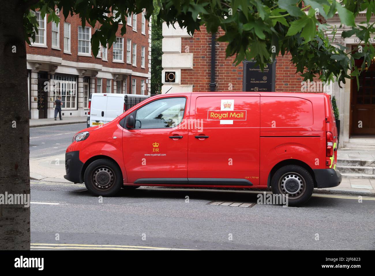 LONDON, UK - JULY 15, 2019: Royal Mail delivery van Peugeot Expert in London, UK. Royal Mail was founded in 1516. It employs 160,000 people. Stock Photo