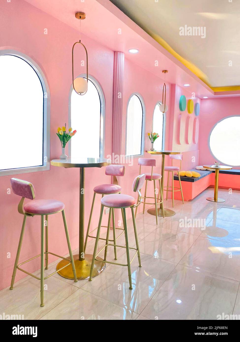 Bright and pink interiordesign for a coffee shop, bakery, cafe, co-working space Stock Photo