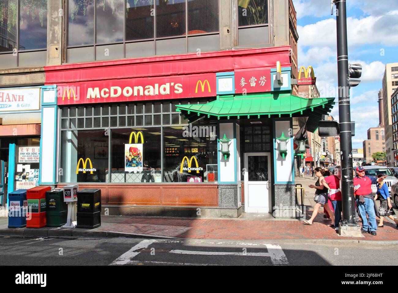 BOSTON, USA - JUNE 8, 2013: People visit McDonald's restaurant in Chinatown in Boston. Boston's Chinatown is the only surviving Chinatown district in Stock Photo