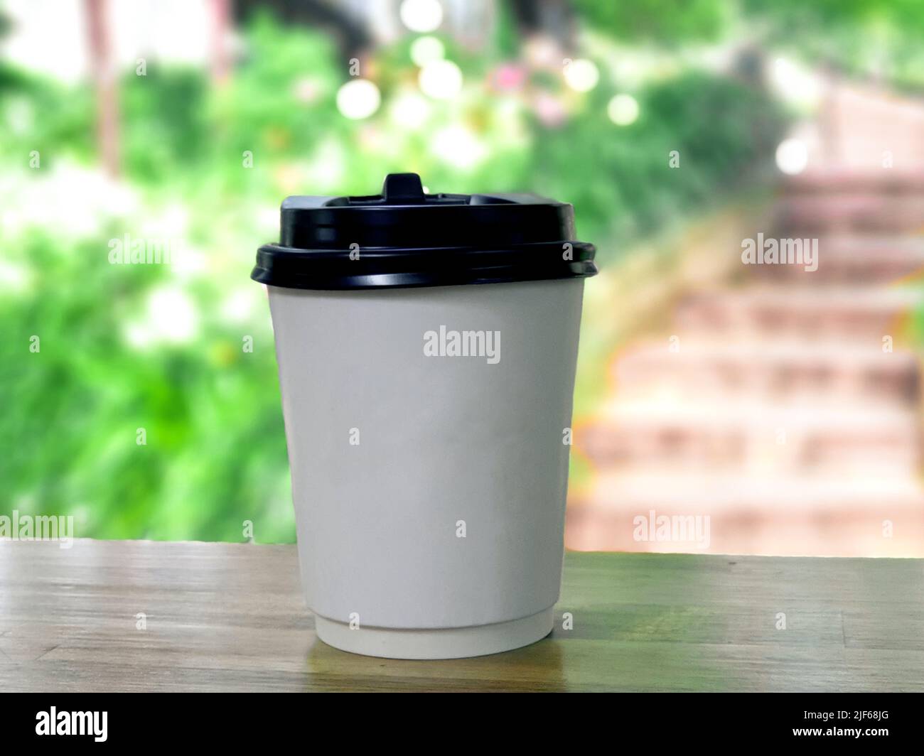 coffee paper cup in front of Arabica coffee shop, is a famous and ...