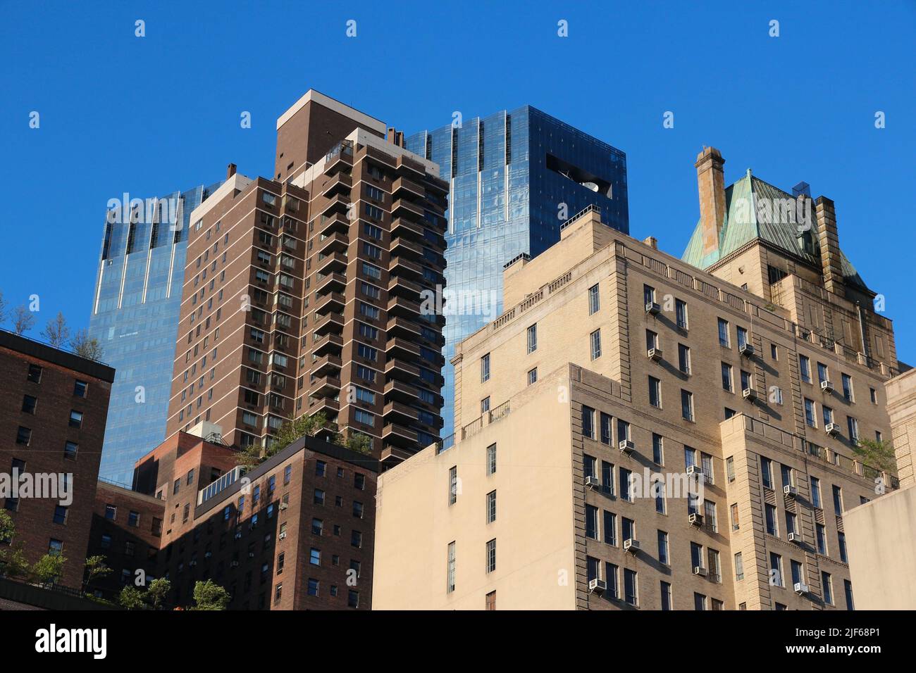 NEW YORK, USA - JULY 5, 2013: Street view in Clinton neighborhood of Midtown Manhattan, New York. Stock Photo