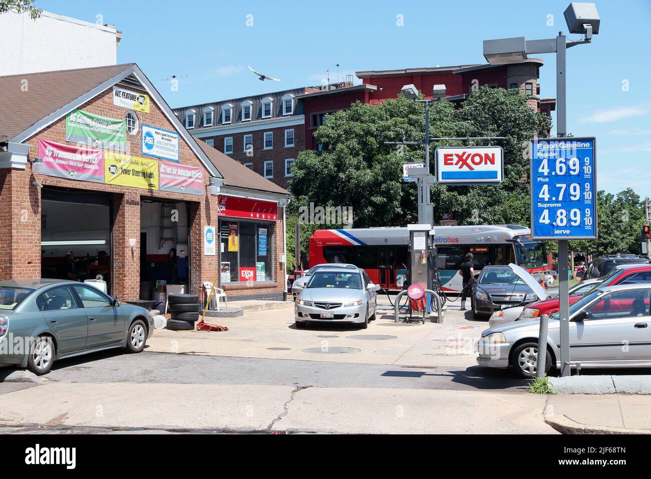 WASHINGTON, USA - JUNE 14, 2013: People visit Exxon gas station in Washington, DC, USA. ExxonMobil is the 3rd largest company in the world by revenue Stock Photo