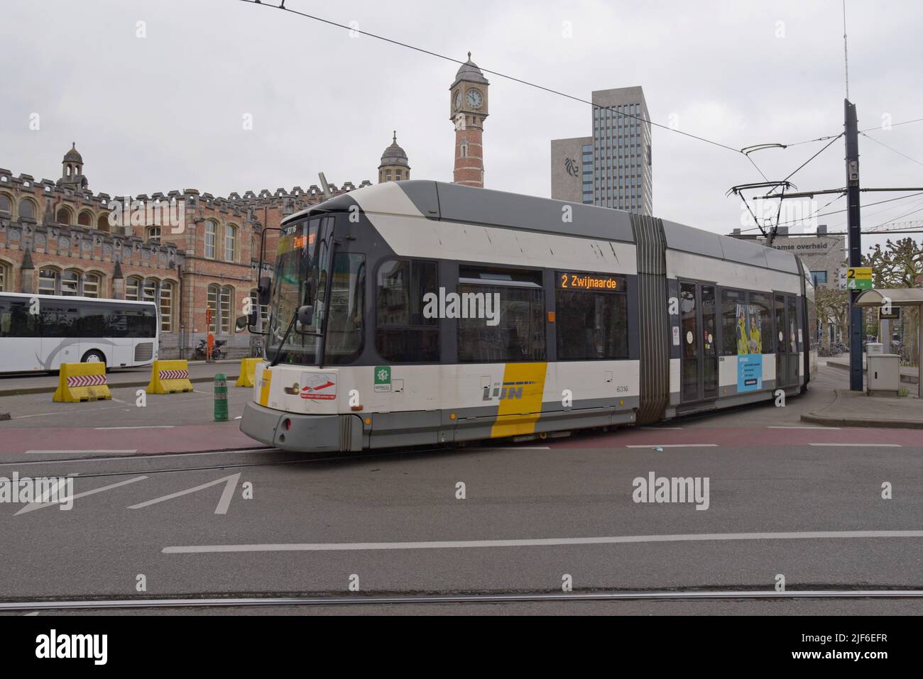 De Lijn tram and bus outside Ghent railway station, Flanders, Belgium - Stock Image
