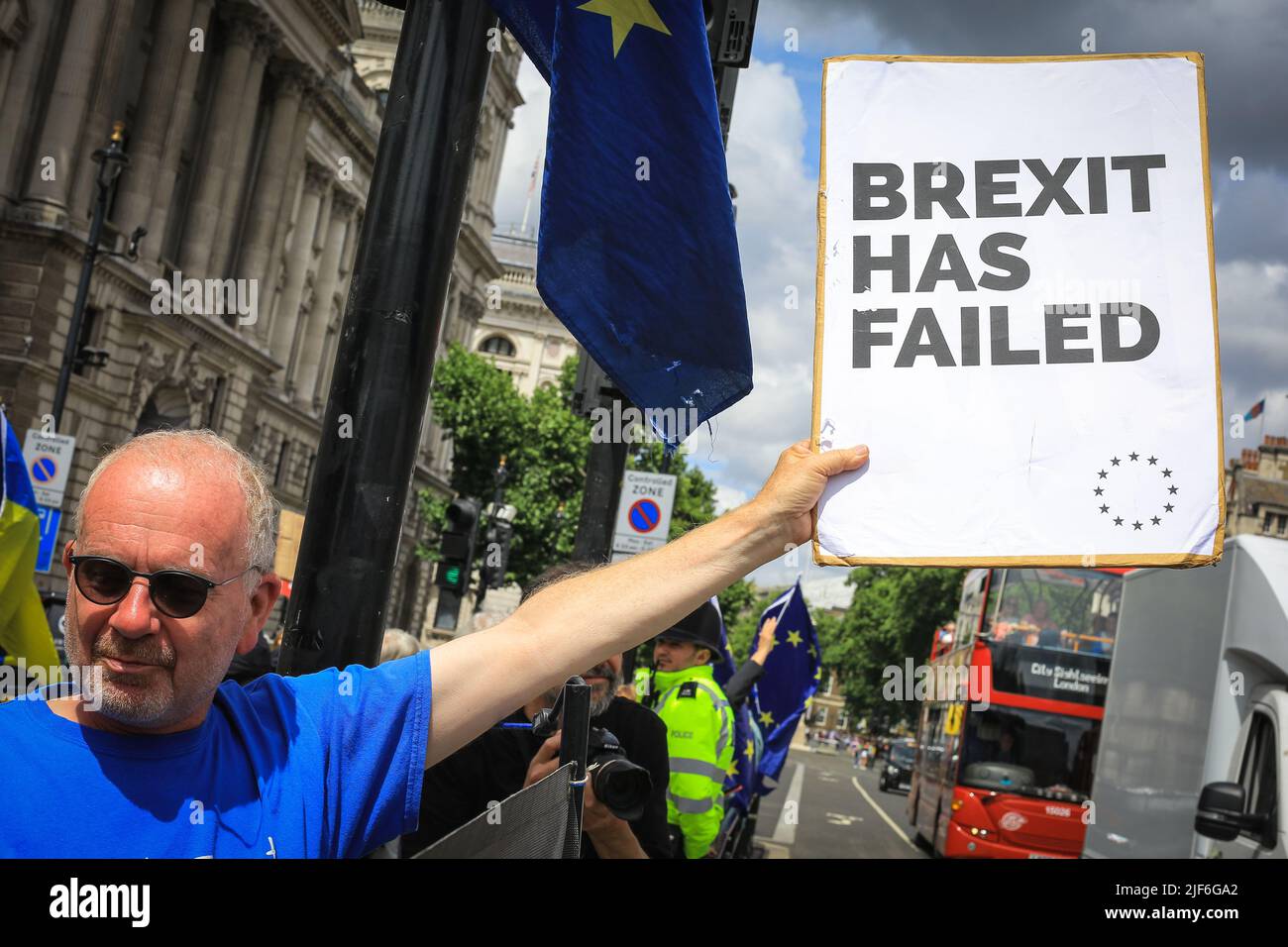 London, UK. 29th June, 2022. Anti government, pro-EU protesters opposite Parliament in Westminster protest with placards, banners, flags and chants. The protesters, including Westminster 'Stop Brexit Man' Steve Bray, had their amplifiers seized by the Met Police on the previous day, but have apparently replaced these with a new sound system, and lound chants. Many display placards in solidarity with Steven Bray. Credit: Imageplotter/Alamy Live News Stock Photo