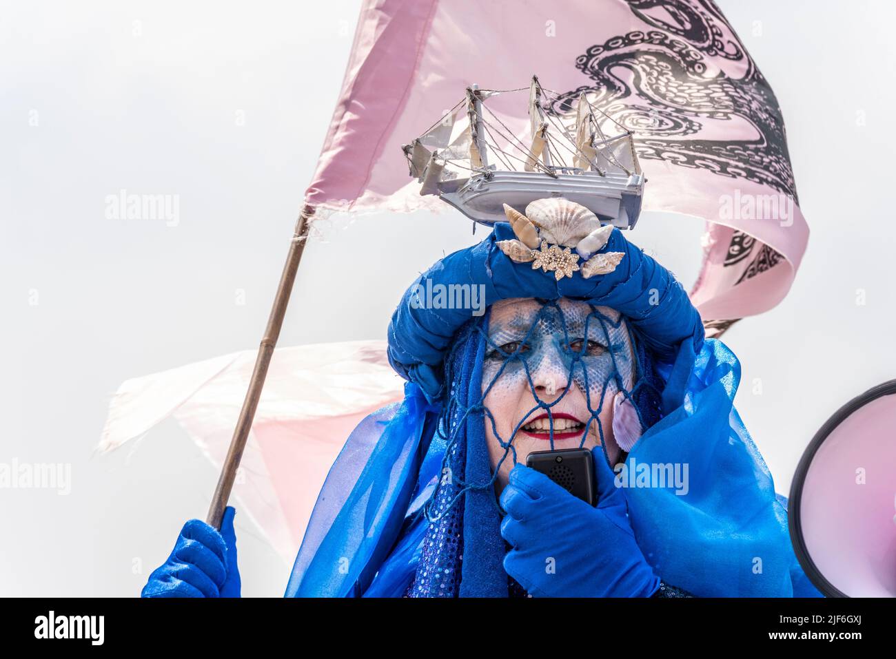 Extinction Rebellion Blue Rebel marine protester protesting at Southend on Sea, Essex, UK, against sewage discharge into the Thames Estuary Stock Photo
