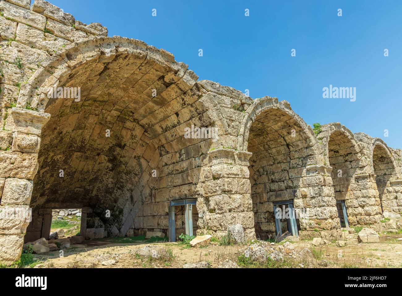 Arches of stadium outer wall built in 2nd century AD in Perge, an ancient Greek city in Anatolia, now in Antalya Province of Turkey. Stock Photo