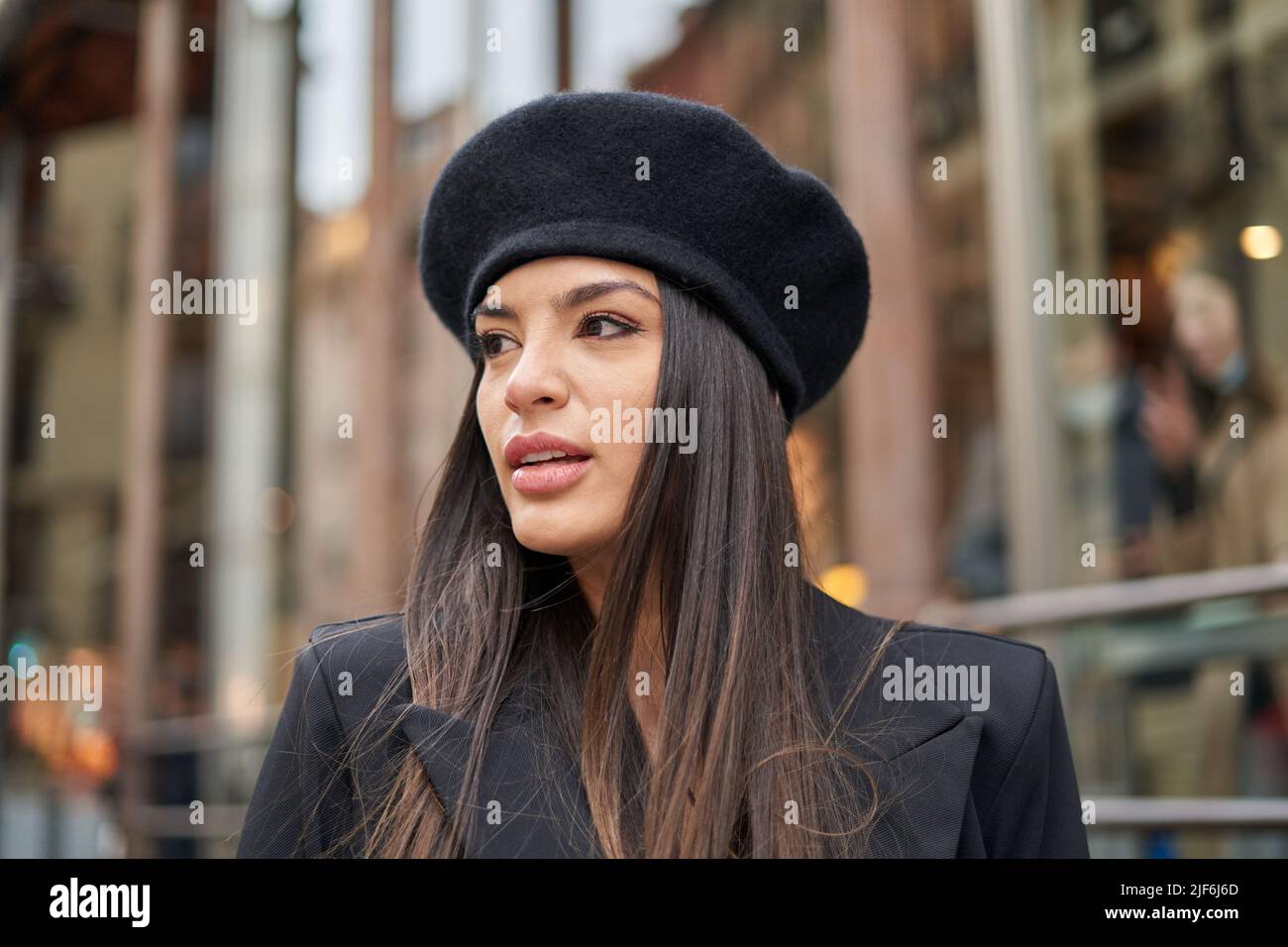 Attractive female with dark hair in 